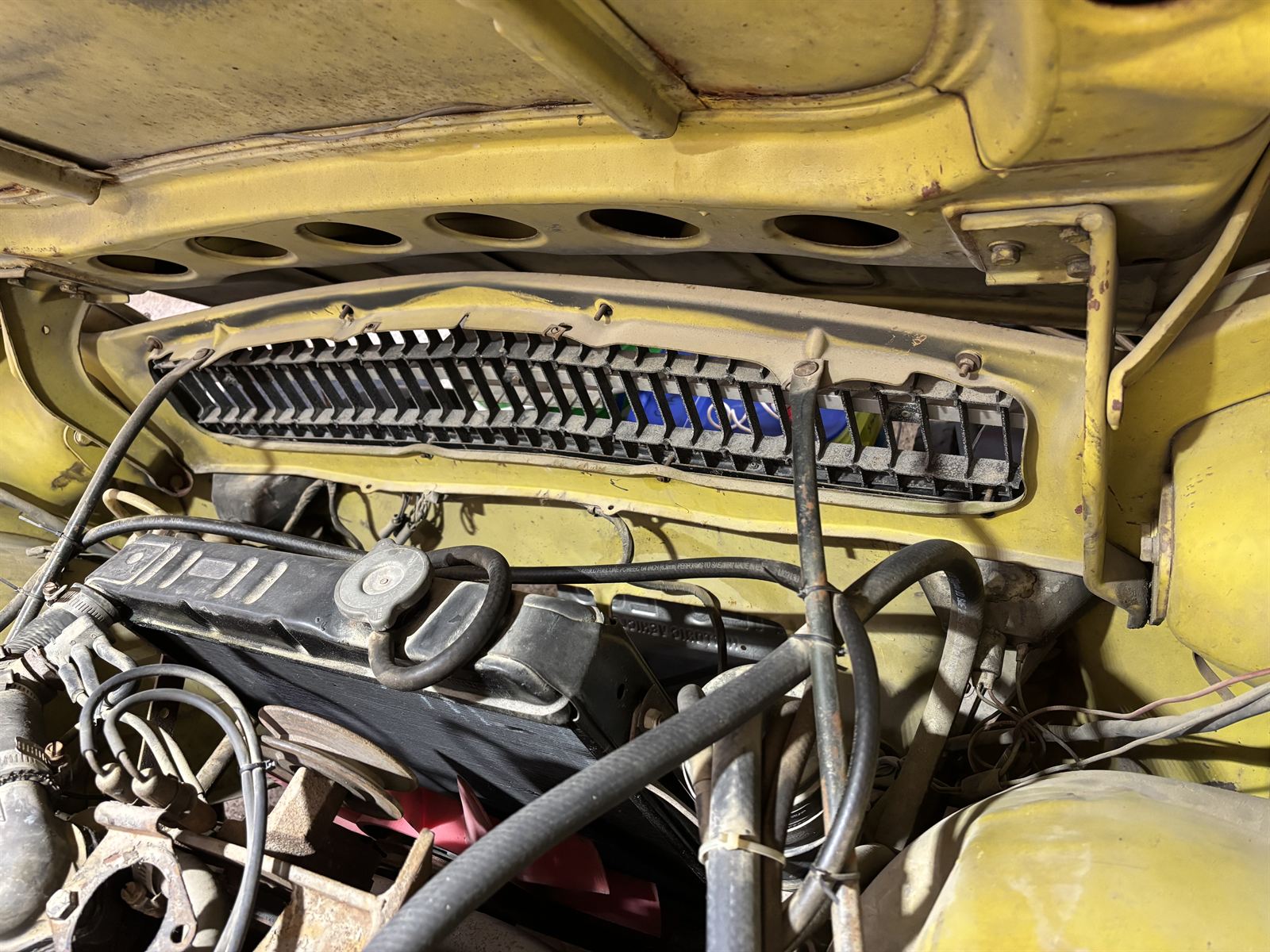 1974 Triumph TR6 engine compartment.